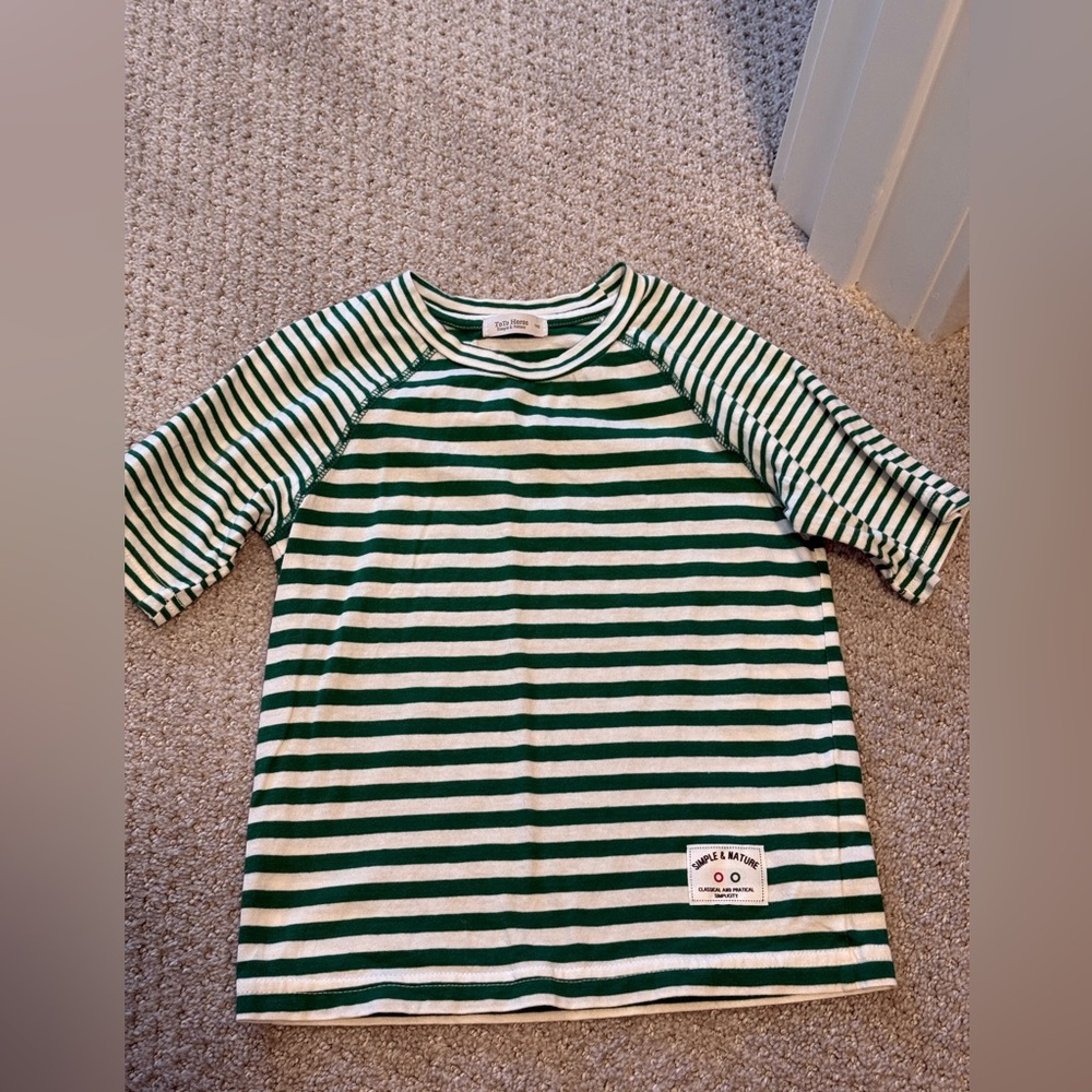 Toto Hero’s green and white stripe top